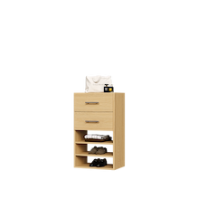 Natural oak closet drawer unit with slab fronts and shelves for closet storage.