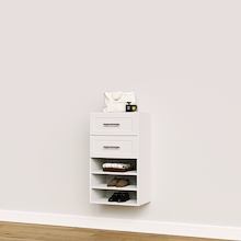 White shaker closet drawer tower with shelves for folded clothing and wardrobe storage.