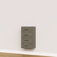 Grey built-in closet drawer cabinet with slab fronts for custom wardrobe storage.