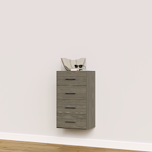 Grey closet drawers with slab fronts for folded clothing, t-shirts, and activewear.