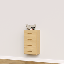 Natural oak closet drawers with slab fronts for linens, towels, and folded clothing.