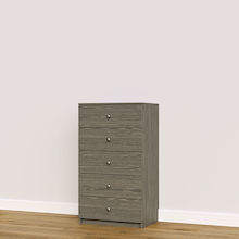 Grey built-in closet drawer chest with slab fronts for custom wardrobe storage.
