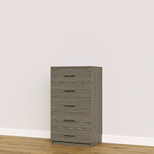 Grey built-in closet drawer cabinet with slab fronts for custom wardrobe storage.