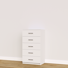 White built-in closet drawers with slab fronts for folded clothing and accessory storage.