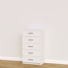White shaker built-in closet drawers for custom wardrobe and closet systems.