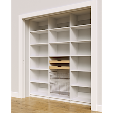 Two wood pull-out drawers and two pull-out wire baskets in a 78 inch white kitchen pantry.