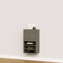 Grey closet drawers with slab fronts and shelves for folded clothing, t-shirts, and activewear storage.
