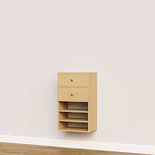 Natural oak built-in closet drawer cabinet with slab fronts and shelves for custom wardrobe storage.