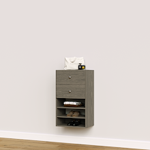 Grey closet drawers with slab fronts and shelves for folded clothing, t-shirts, and activewear storage.