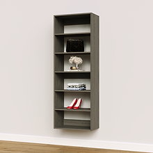 Grey 24 inch closet organizer unit for space-saving storage in a modern apartment.