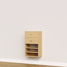 Natural oak built-in closet drawer cabinet with slab fronts and shelves for custom wardrobe storage.