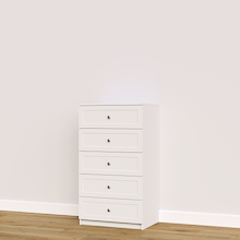 White shaker built-in closet drawers for custom wardrobe and closet systems.
