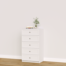 White shaker 5-drawer closet storage tower for folded clothing and wardrobe storage.