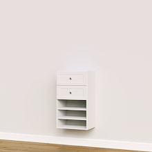 White shaker built-in closet drawer tower with shelves for custom wardrobe storage.