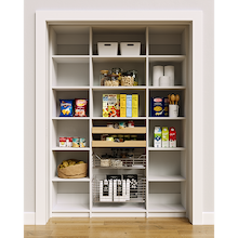 60 inch white pantry organization showing mixed drawer and basket storage with open shelving.