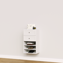 White shaker closet drawer tower with shelves for folded clothing and wardrobe storage.