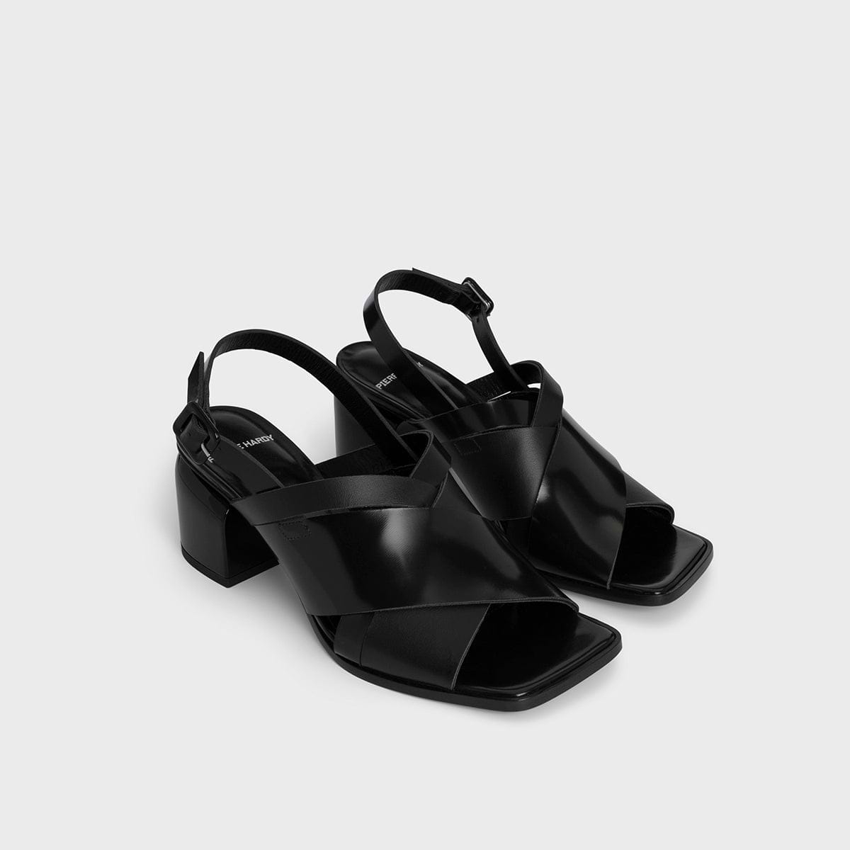 ALPHA CROSS HEELED SANDAL