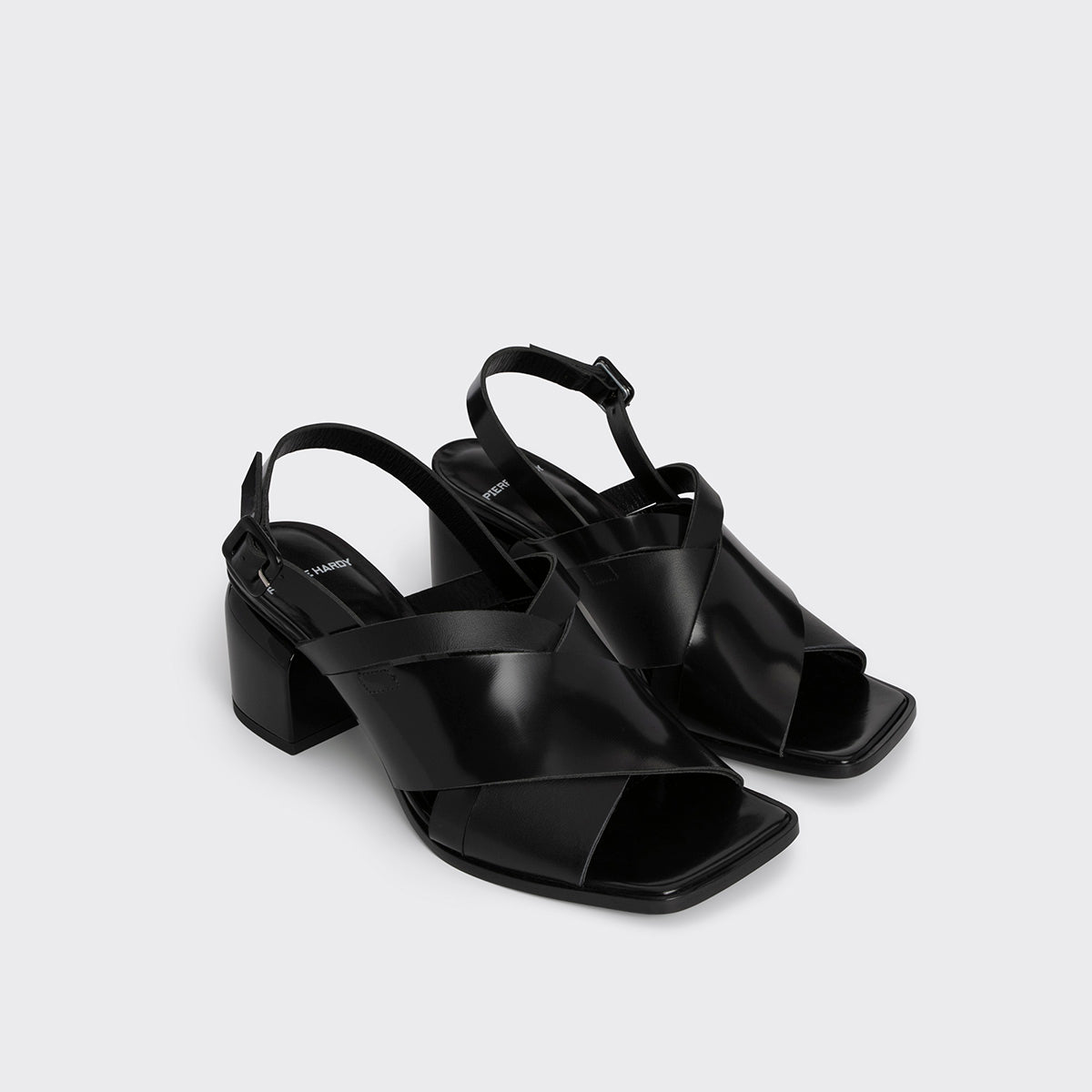 ALPHA CROSS HEELED SANDAL