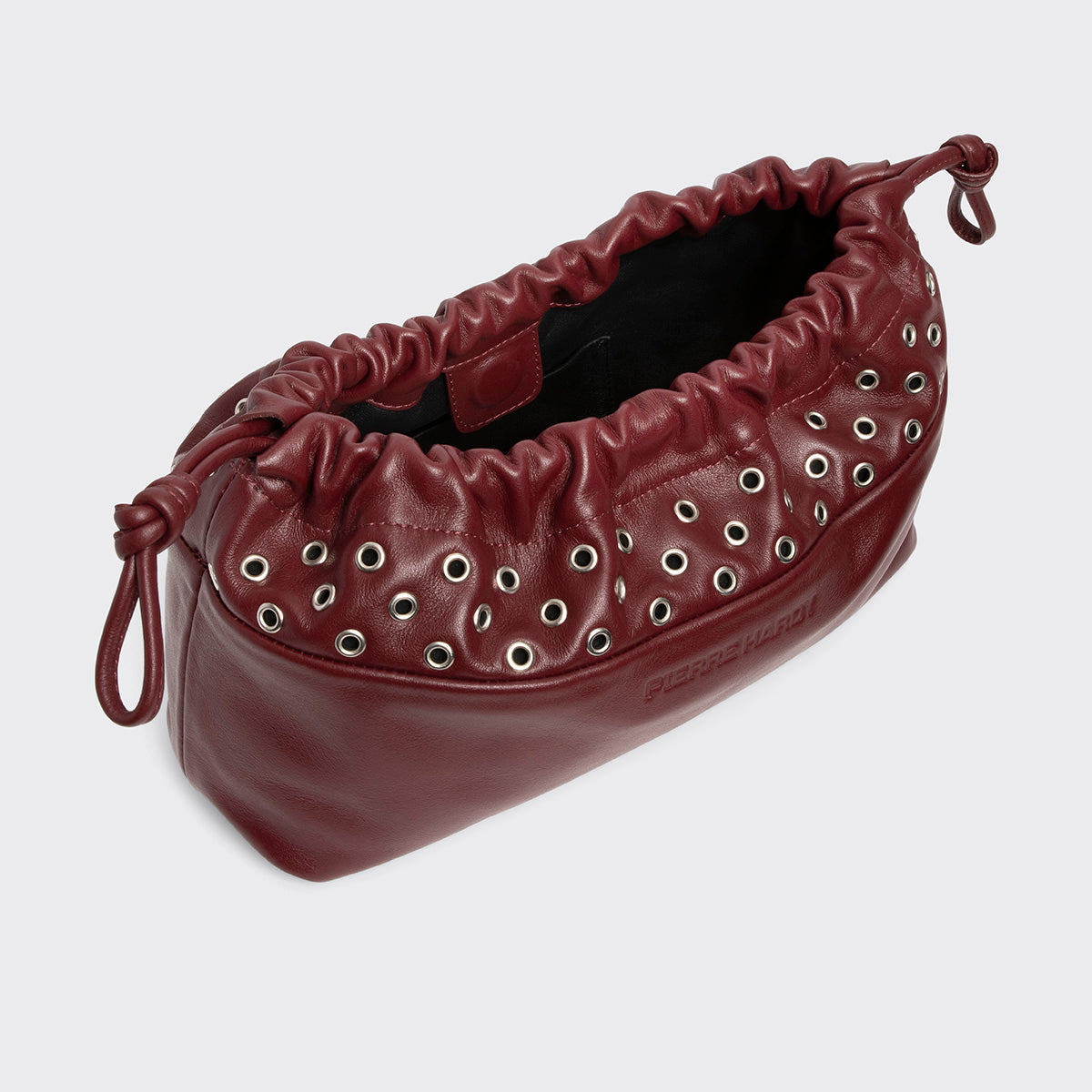 TWIN CLUTCH WITH EYELETS