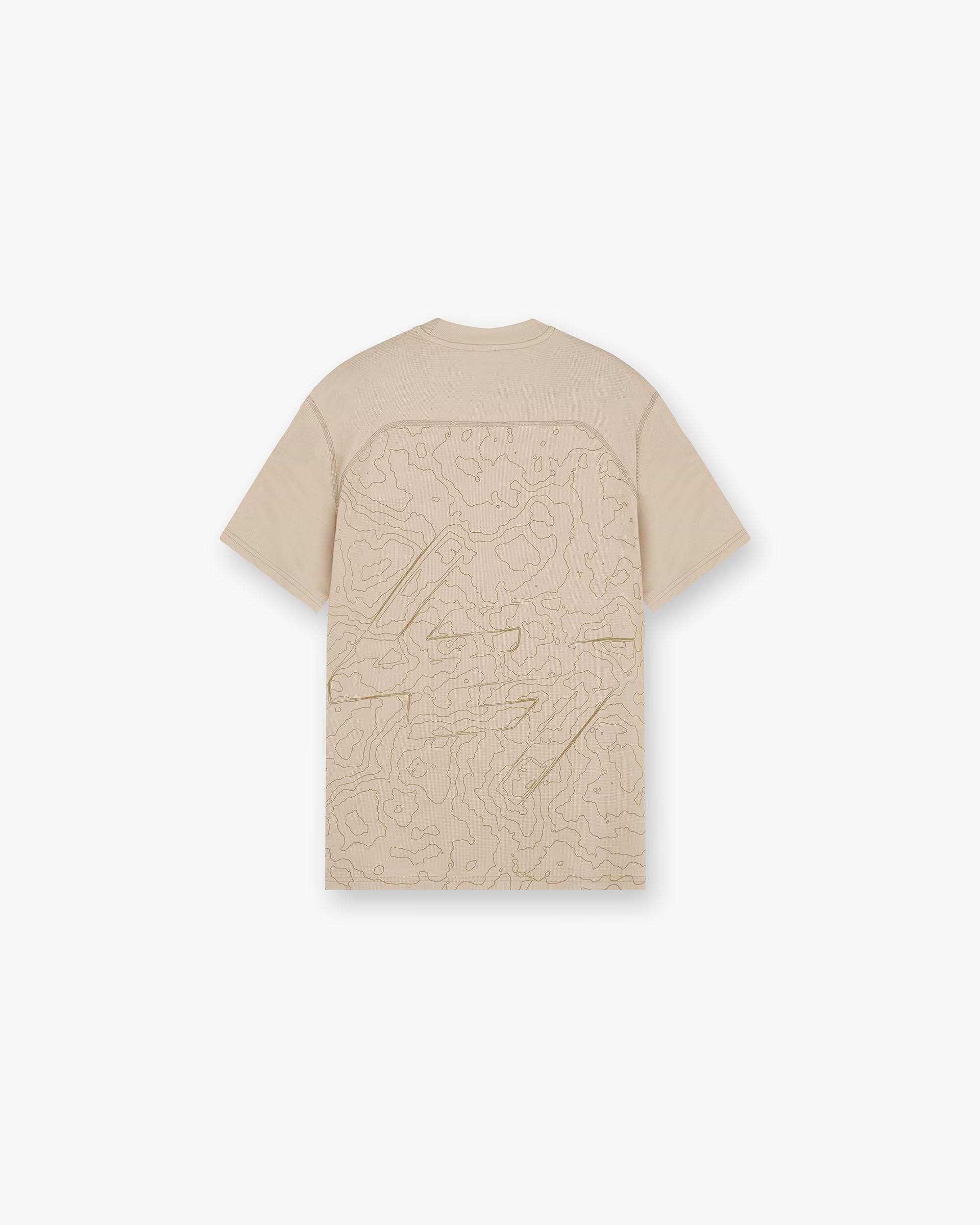 Front product image of a mens grey t-shirt on a plain white background | 247 Contour Run T-Shirt in Pebble | T-shirt with cupro forest print | 247 T-Shirts | Represent Clo