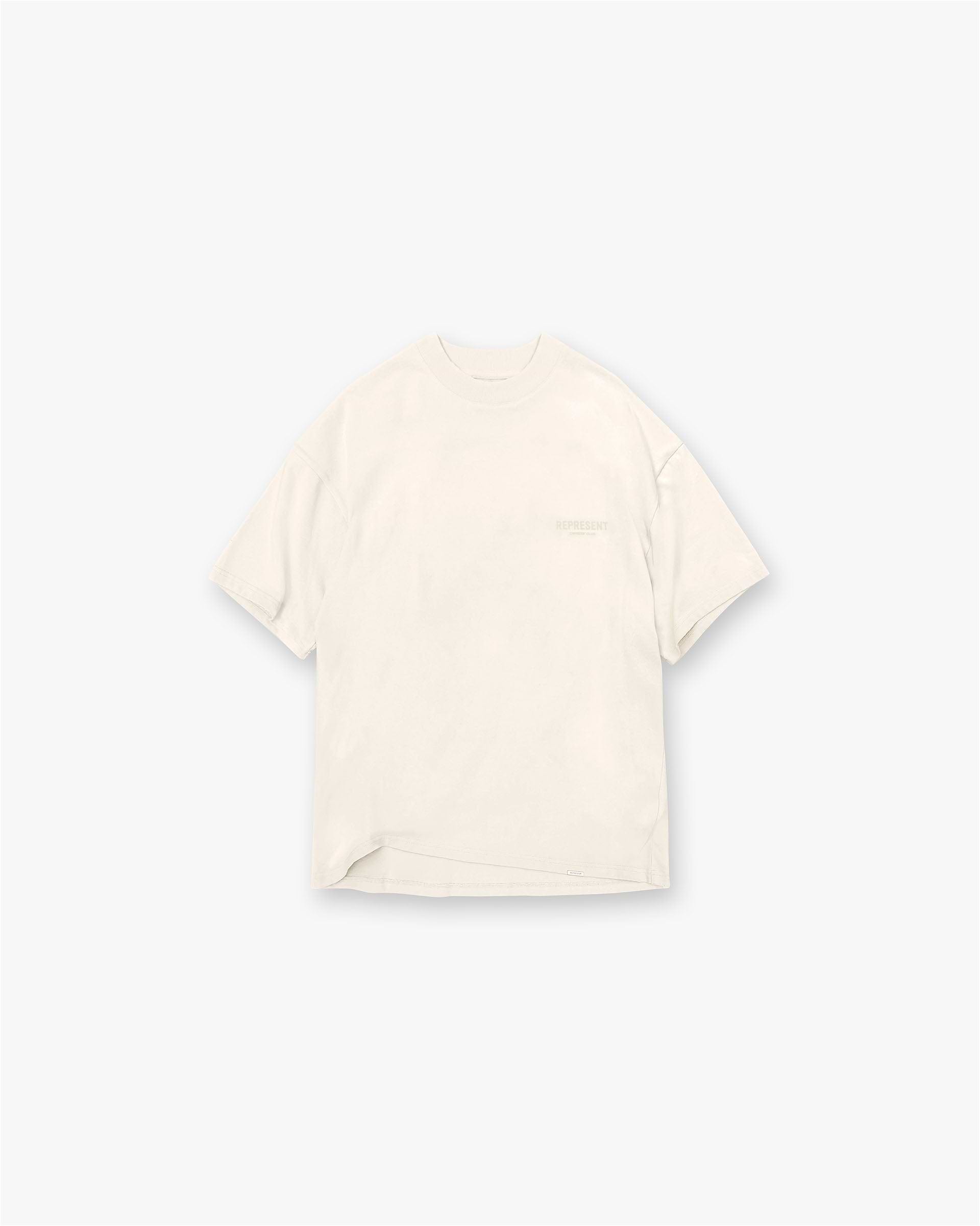 Back product image of a mens buttercream t-shirt on a plain white background | Represent Owners Club T-Shirt in Buttercream | Oversized fit t-shirt with round neck | Owners Club T-Shirts | Represent Clo