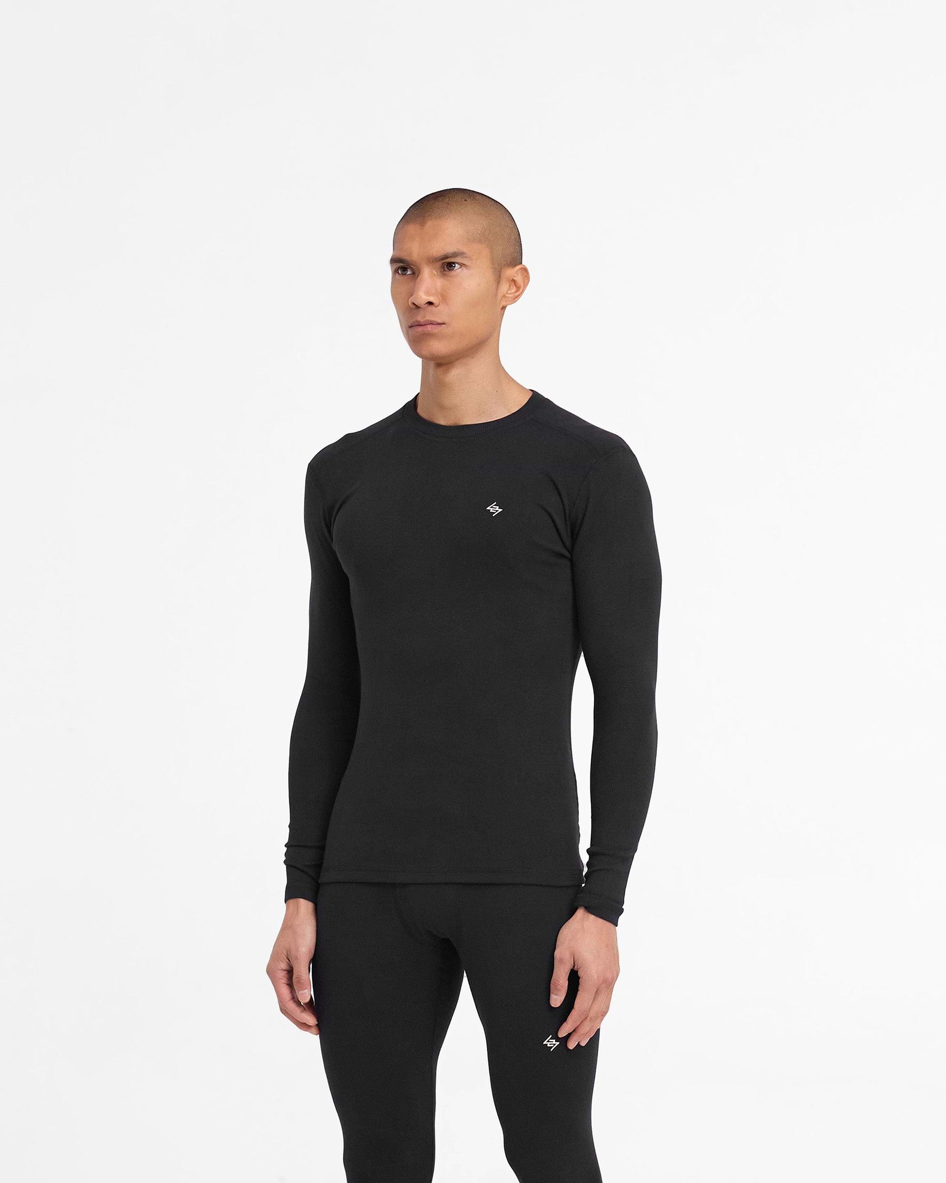 Back product image of a mens black ribbed long sleeve top on a plain white background | 247 Ribbed Long Sleeve Top in Black | Ribbed long sleeve top with a close fit and embroidered logo | 247 T-Shirts | Represent Clo