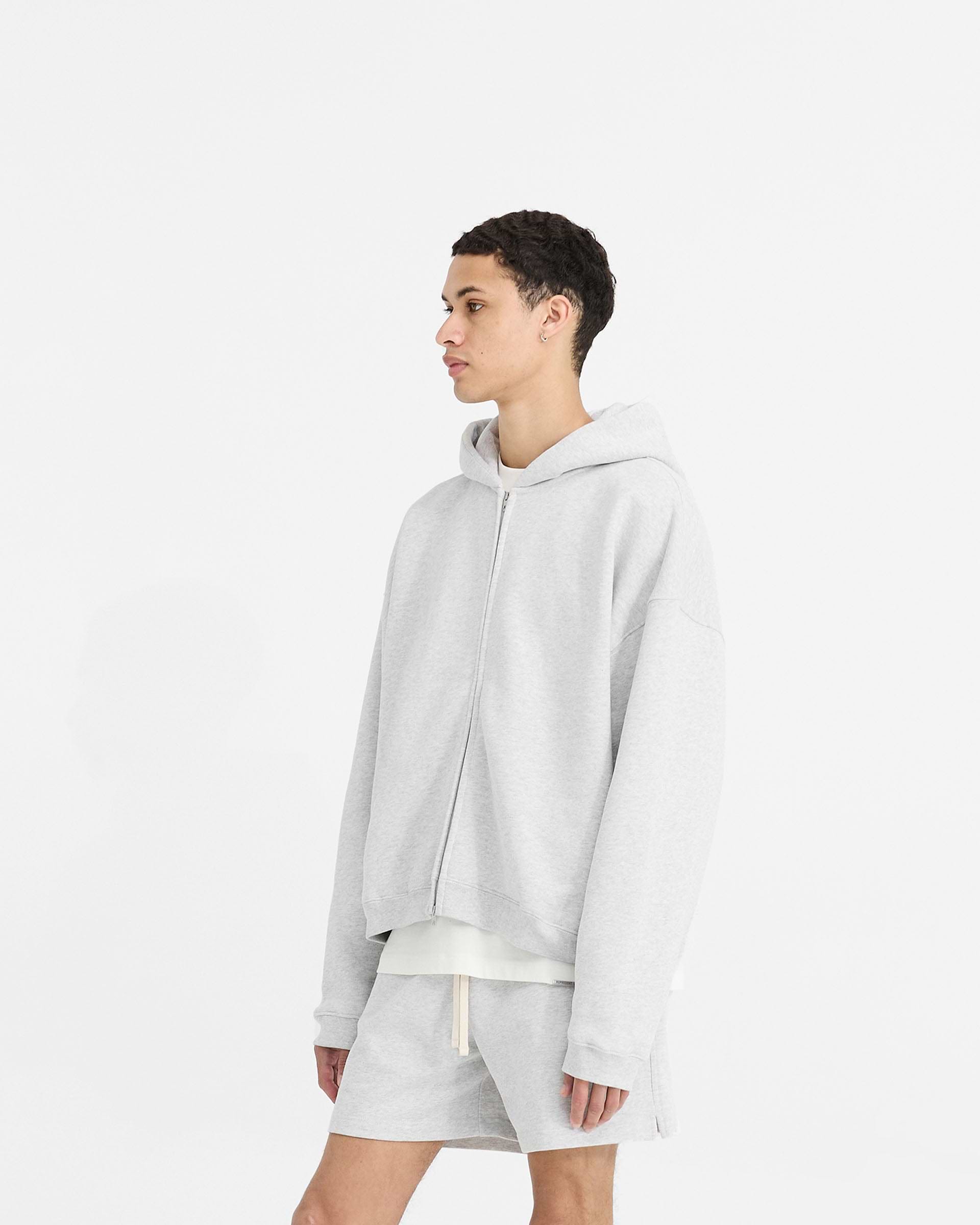 Back product image of a mens grey hoodie on a plain white background | Initial Boxy Zip Through Hoodie in Ice Grey Marl | Oversized boxy fit zip through hoodie | Initial Hoodies | Represent Clo