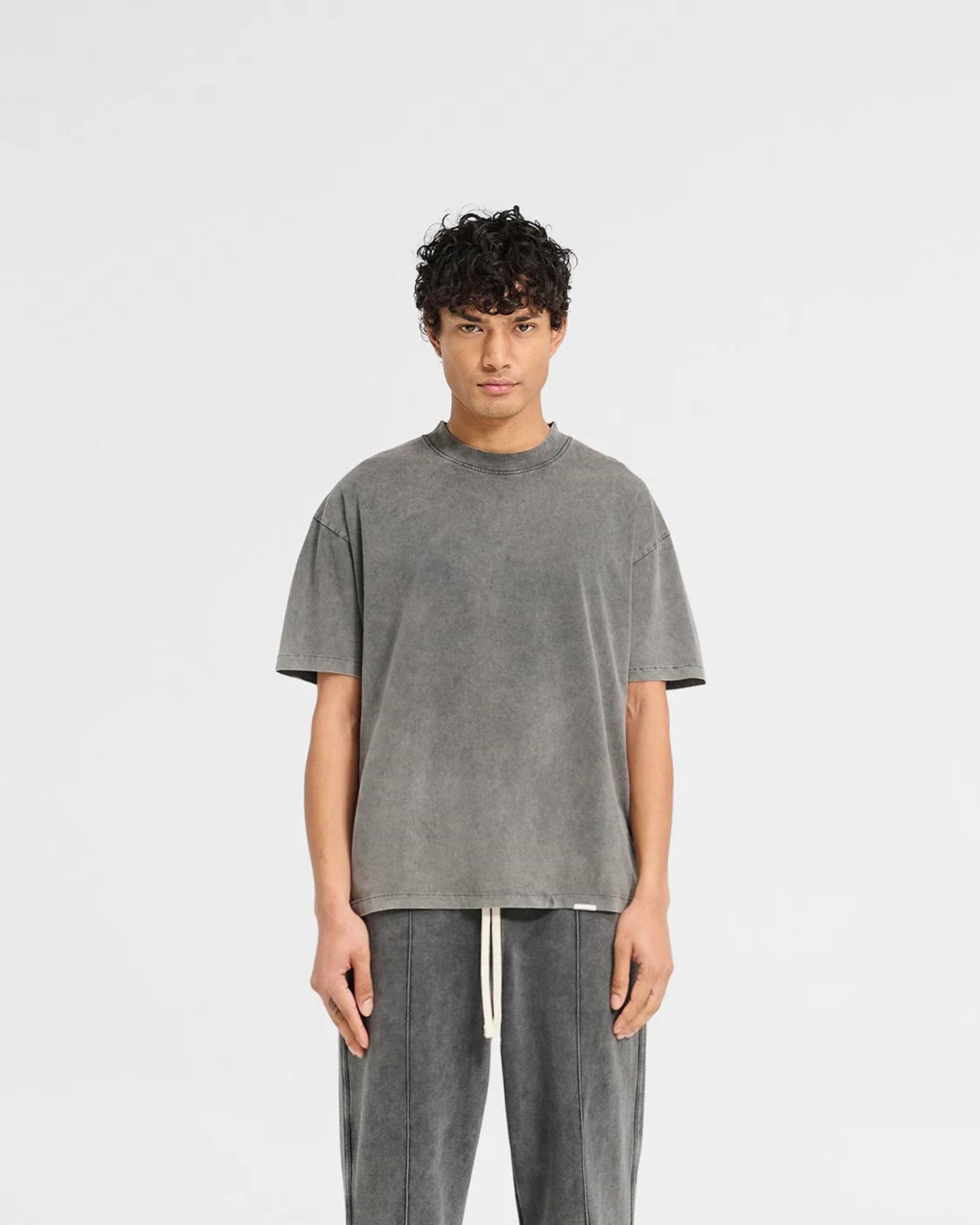 Man wearing a grey t-shirt on a plain white background | Initial T-Shirt in Vintage Grey | Regular fit cotton t-shirt with embroidered details | Initial T-Shirts | Represent Clo