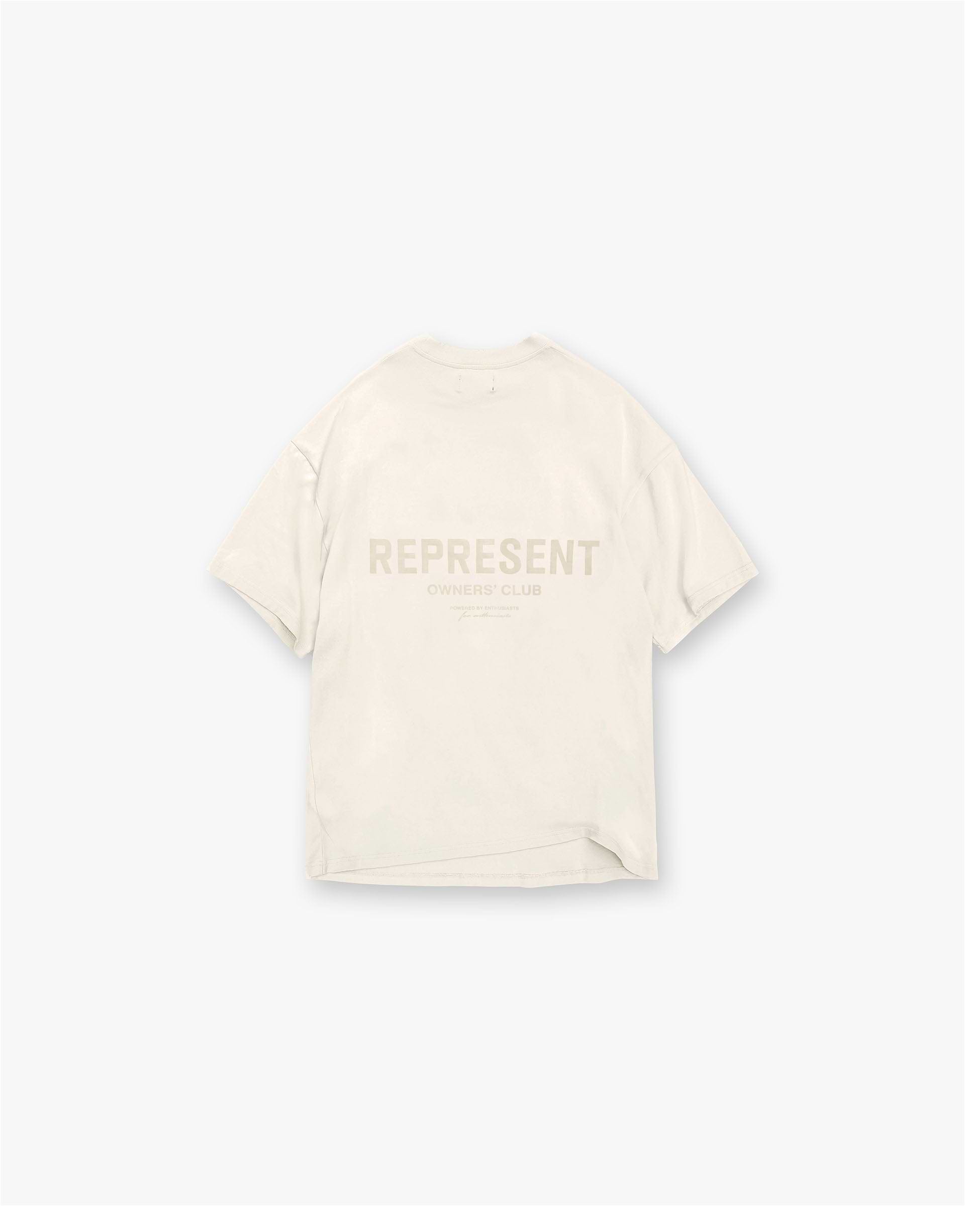 Front product image of a mens cream t-shirt on a plain white background | Represent Owners Club T-Shirt in Buttercream | Oversized t-shirt with puff print graphics | Owners Club T-Shirts | Represent Clo