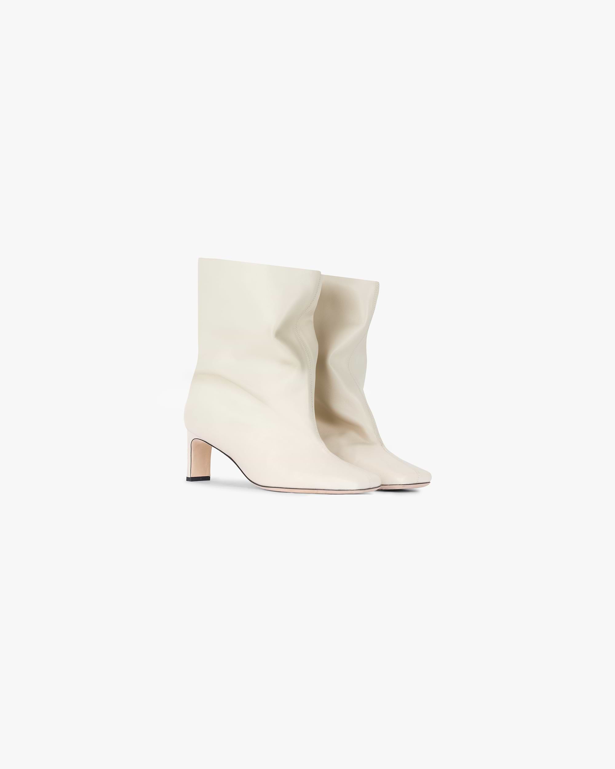 Back product image of a womens ecru ankle boot on a plain white background | Square Toe Ankle Boot in Ecru | Ankle boots with lambskin nappa leather and slouchy look | Womens SS25 Footwear | Represent Clo