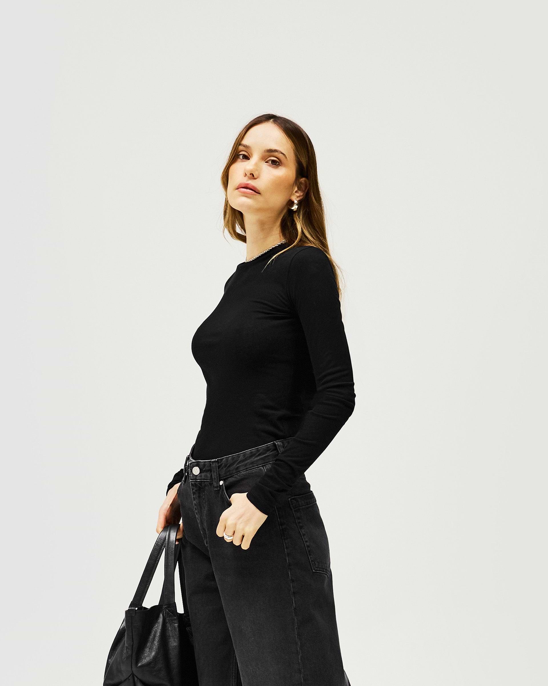 Back product image of a womens black long sleeve tee on a plain white background | Trigger Long Sleeve in Black | Slim fit long sleeve cotton knitwear | Womens SS25 Knitwear | Represent Clo