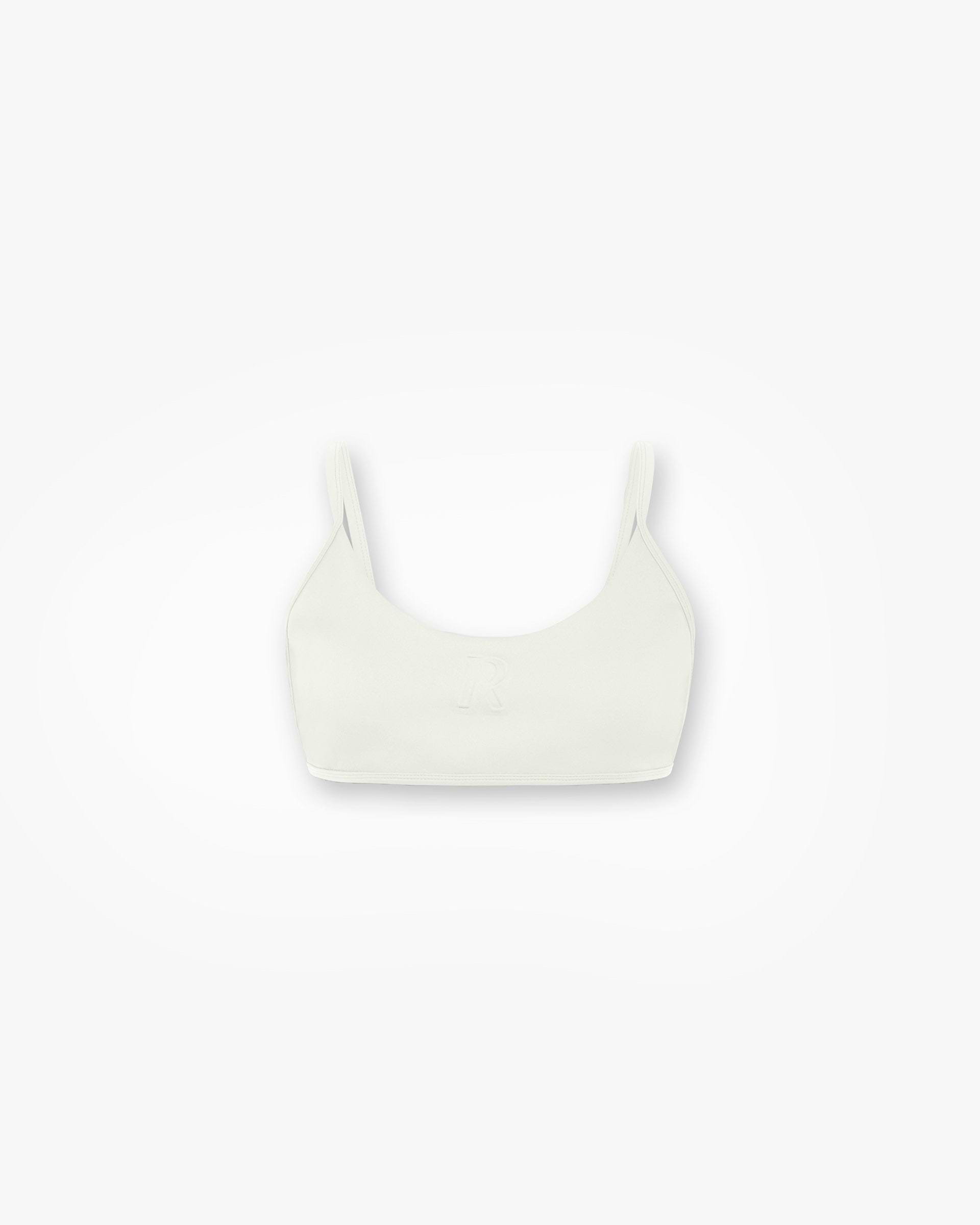 Front product image of a womens white bralette on a plain white background | Control Bralette in Warm White | Polyester and elastane bralette | Womens SS25 Tops | Represent Clo