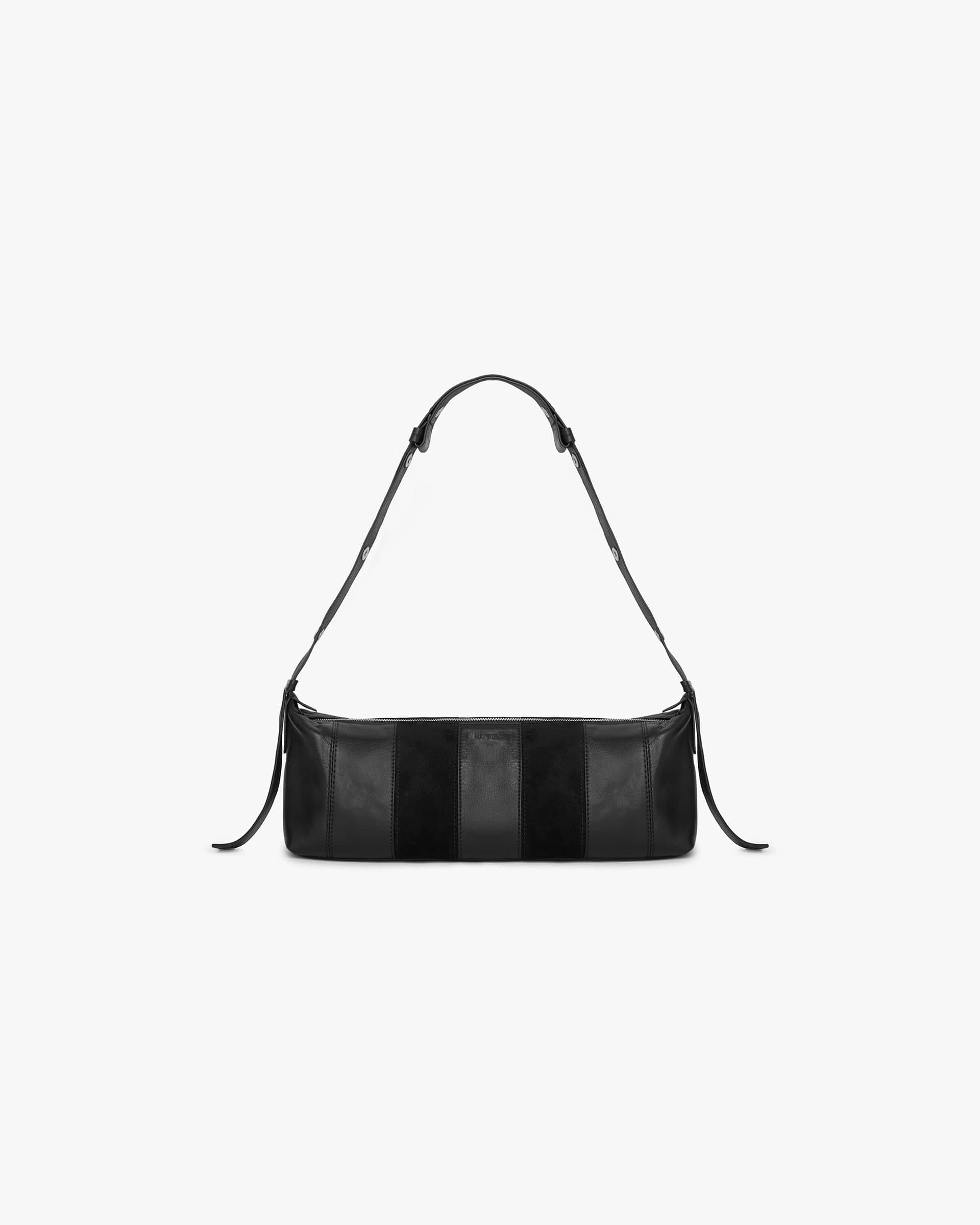Front product image of a womens black bag on a plain white background | Snap Baguette Bag in Jet Black | Structured women's handbag | Womens SS25 Accessories | Represent Clo