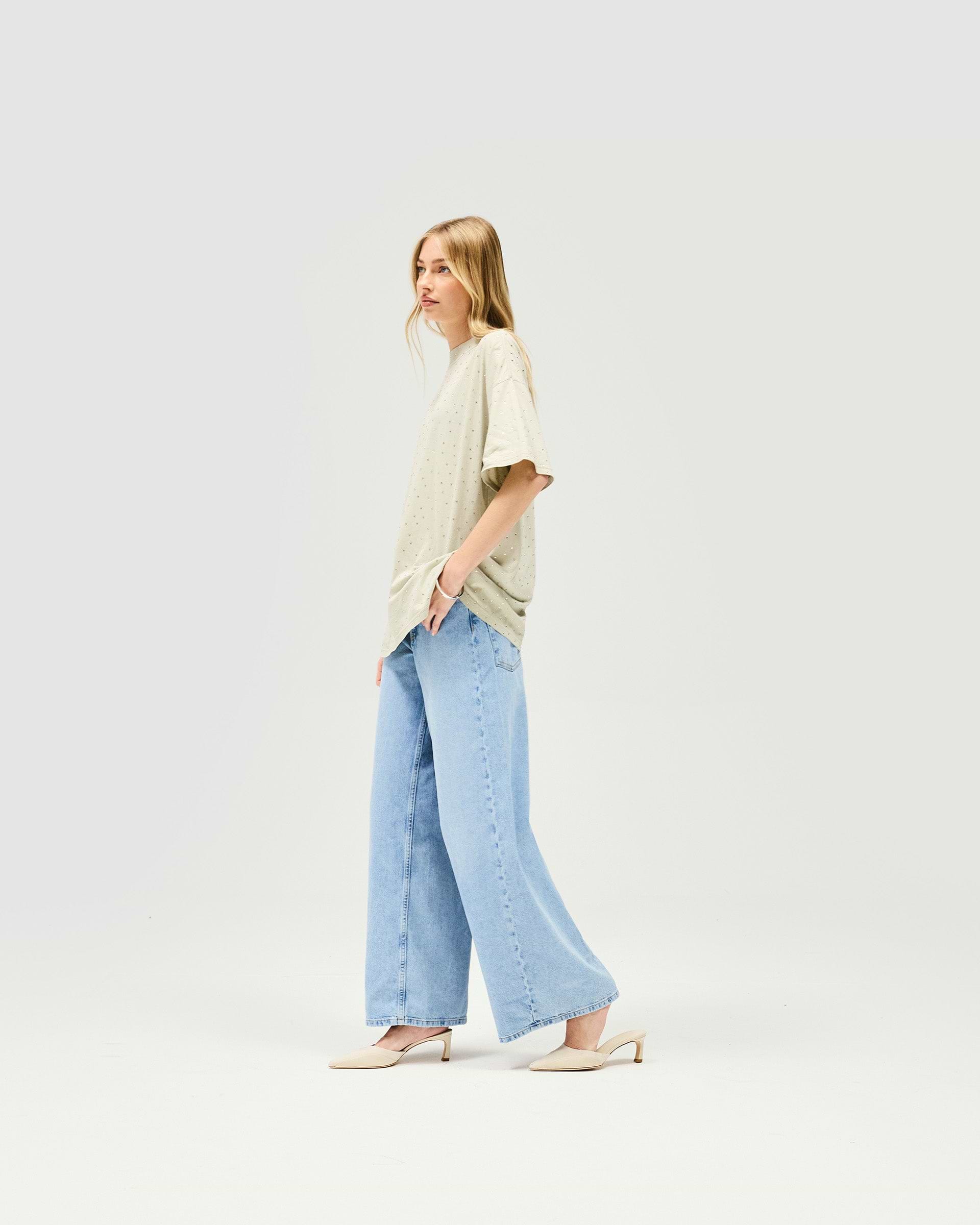 Back product image of a womens grey t-shirt on a plain white background | Spark T-Shirt in Storm | Oversized fit t-shirt with hot fix detail | Womens SS25 Tops | Represent Clo