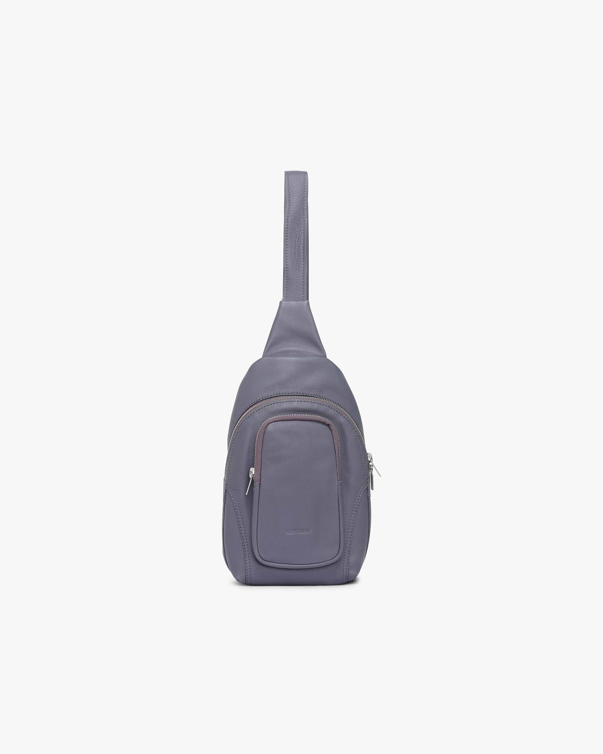 Front product image of a womens grey utility sling bag on a plain white background | Utility Sling Bag in Excalibur | Functional design with secure compartments | Womens SS25 Accessories | Represent Clo