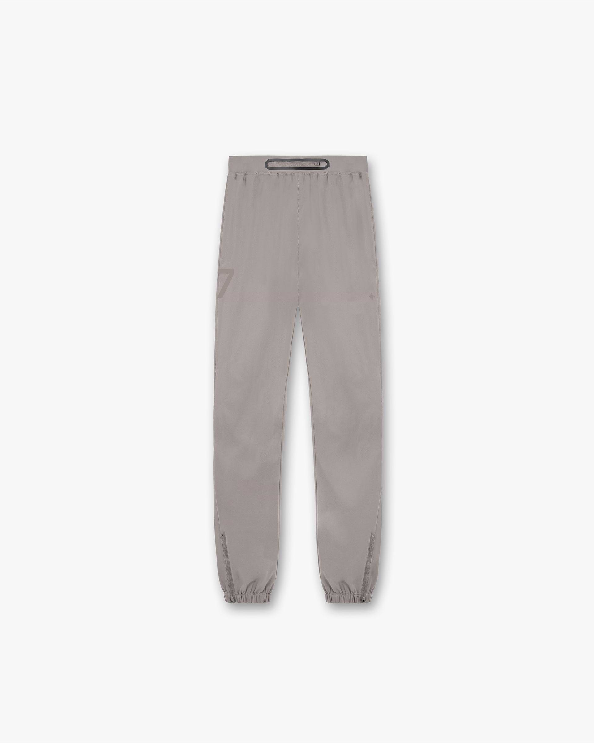 Back product image of mens grey pants on a plain white background | 247 Training Pant in Cinder | Training pants with zip cuffs and elasticated waistband | 247 Pants | Represent Clo