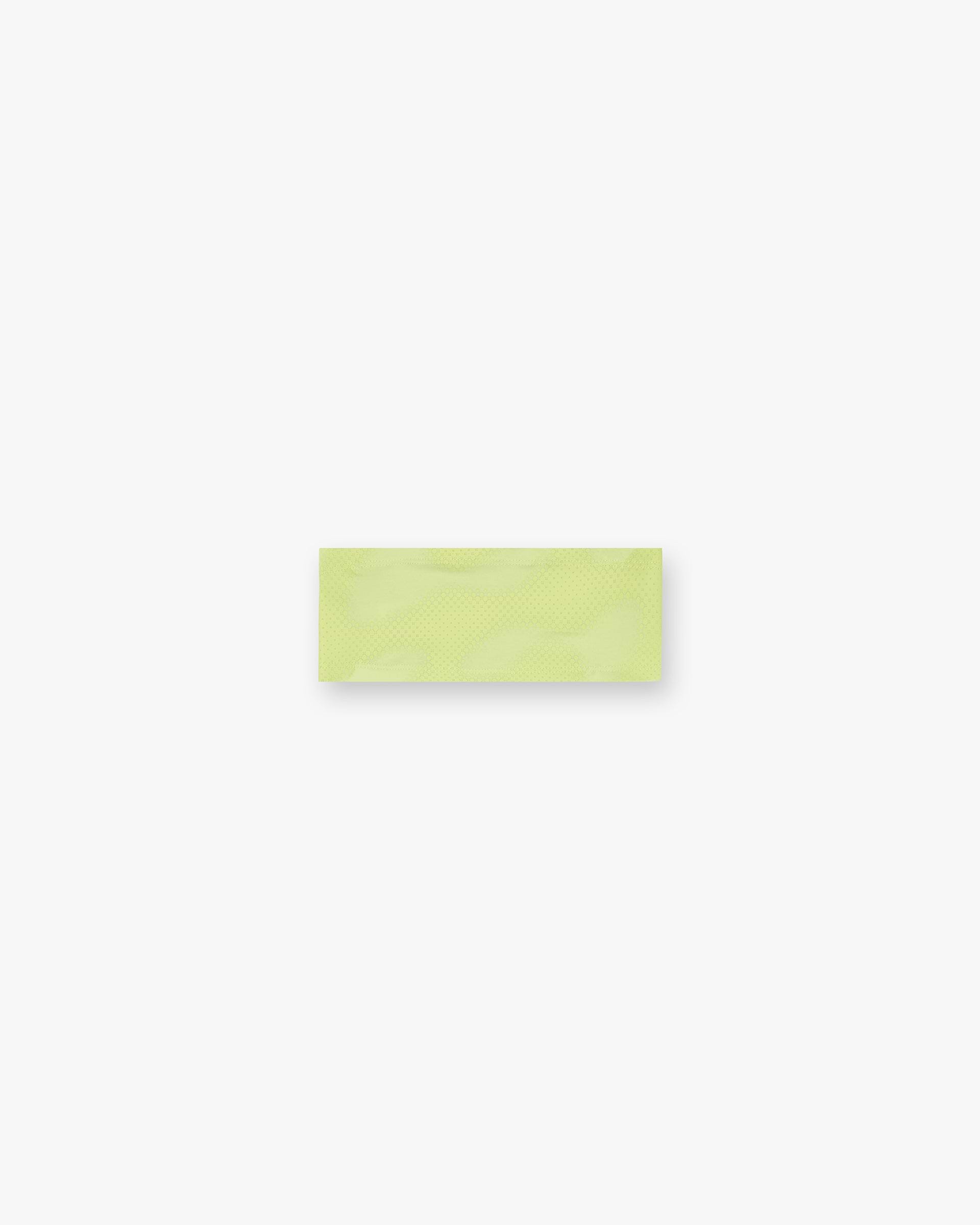 Front product image of a womens lime headband on a plain white background | 247 Future Terrains Headband in Shadow Lime | Lightweight headband accessory | 247 Accessories | Represent Clo