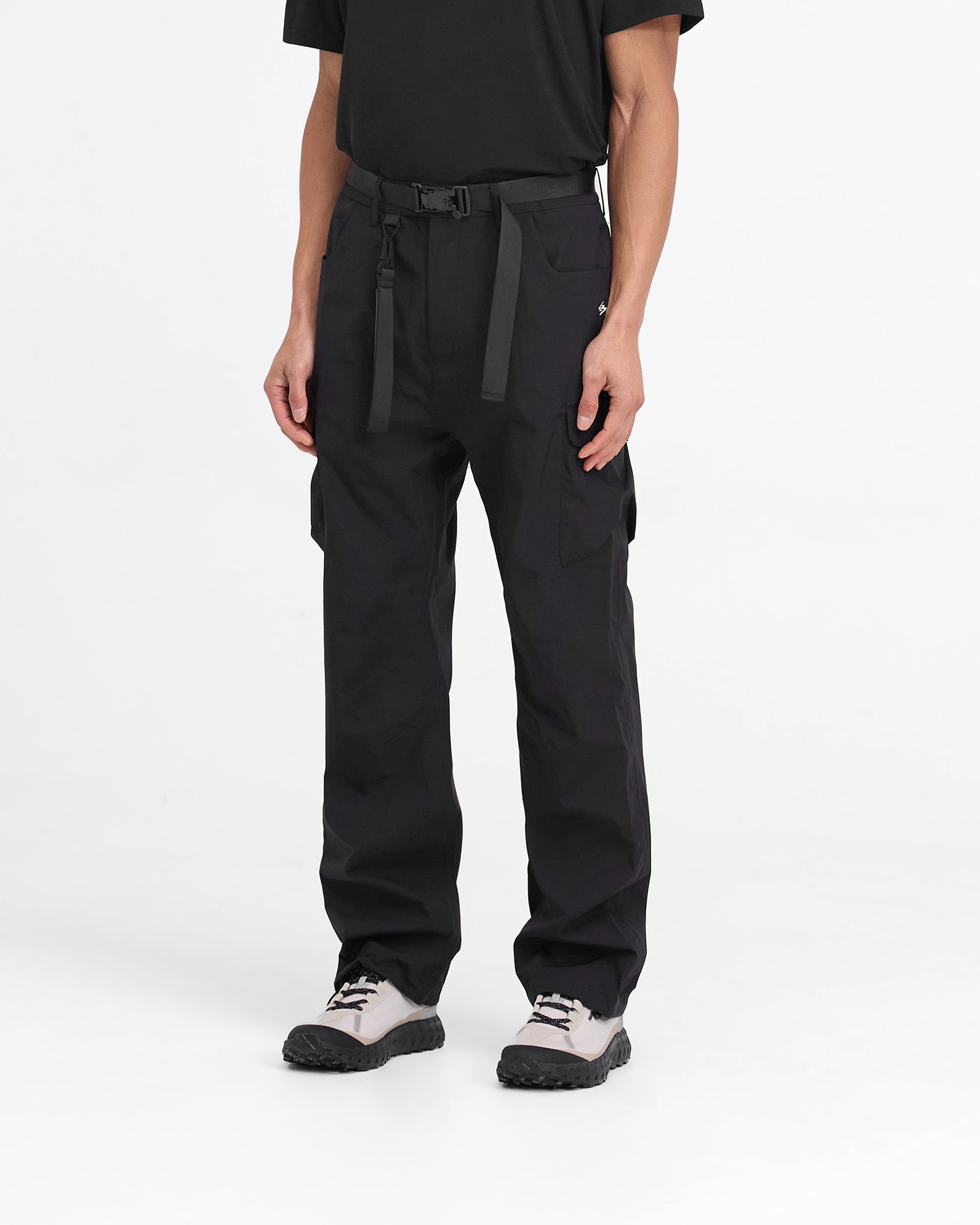 Back product image of mens black cargo pants on a plain white background | 247 Technical Cargo Pant in Black | Straight leg cargo pants with waterproof detailing | 247 Pants | Represent Clo