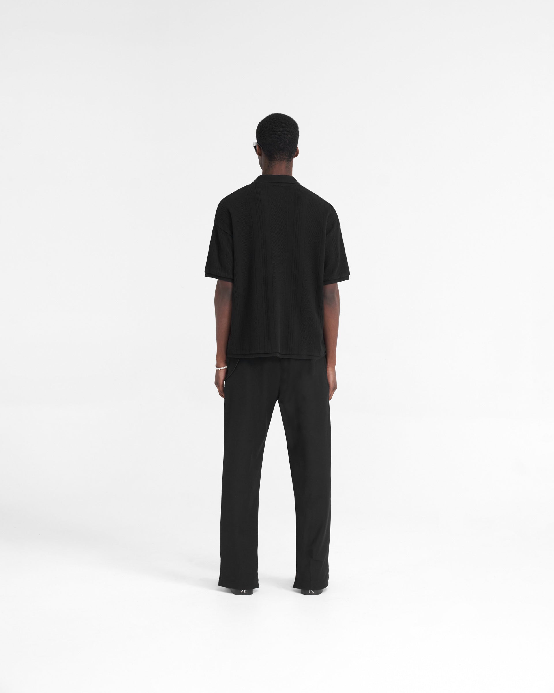 Open Stitch Polo - Schwarz