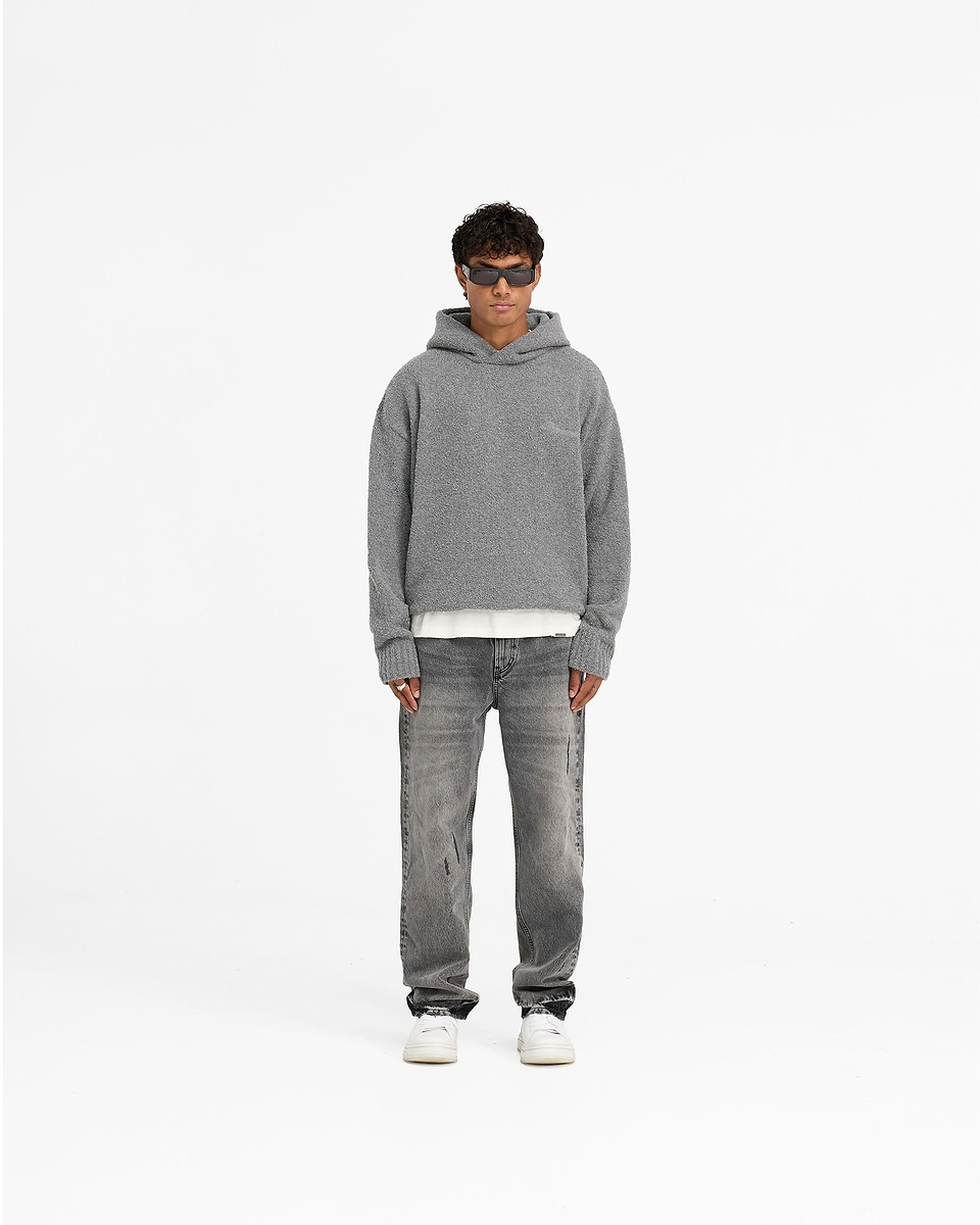Man wearing an oversized grey boucle hoodie on a plain white background | Heavy Boucle Hoodie in Rock | Double lined oversized boxy hoodie | FW24 Knitwear | Represent Clo