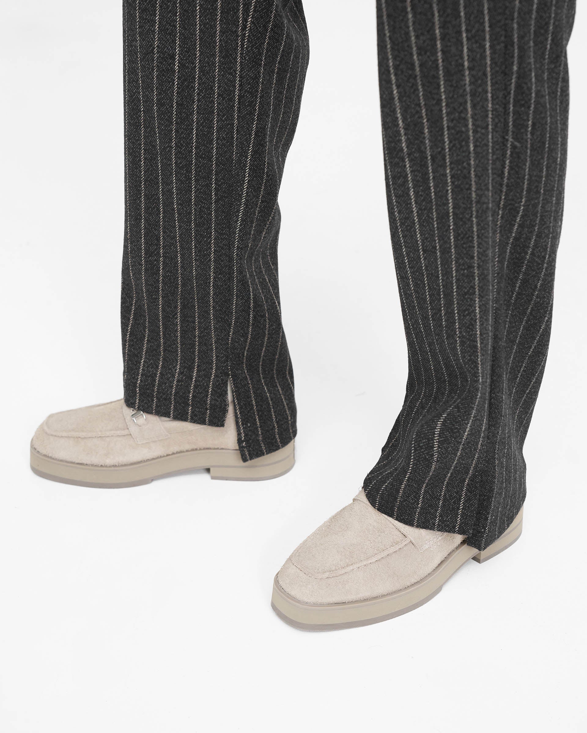 Hose mit abgestuftem Saum - Schwarze Nadelstreifen