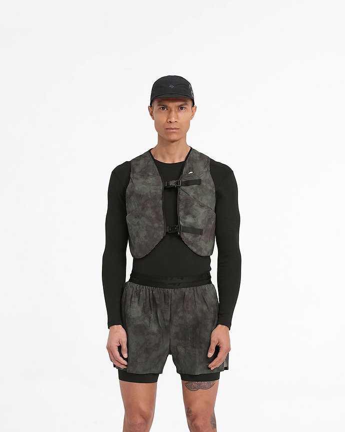 Man wearing a chest rig in terrain on a plain white background | Team 247 Chest Rig in Terrain | Accessories with magnetic buckles and multiple stretch power mesh pockets | 247 Accessories | Represent Clo