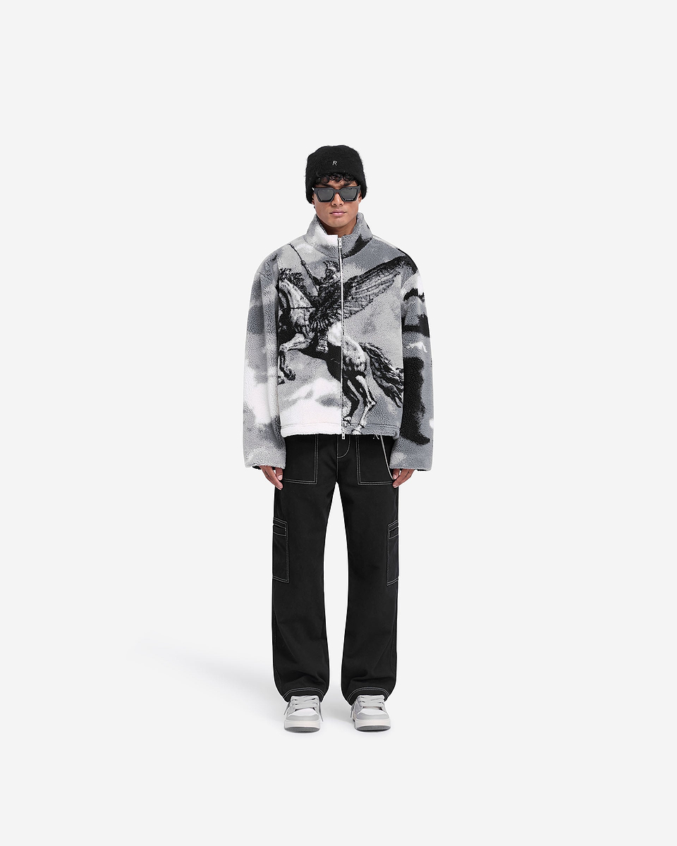 Man wearing a multi-coloured fleece on a plain white background | Mascot Fleece in Multi | Very oversized fleece with mascot print | FW24 Outerwear | Represent Clo