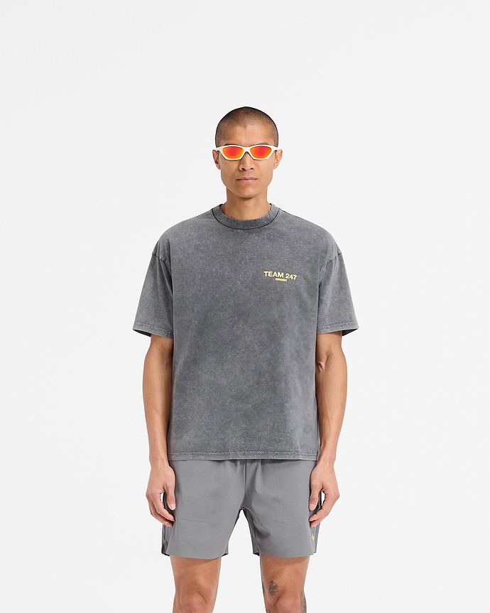 Man wearing an oversized grey t-shirt on a plain white background | Team 247 Oversized T-Shirt in Pewter Lemon | Quick drying 4-way stretch oversized t-shirt | 247 T-Shirts | Represent Clo