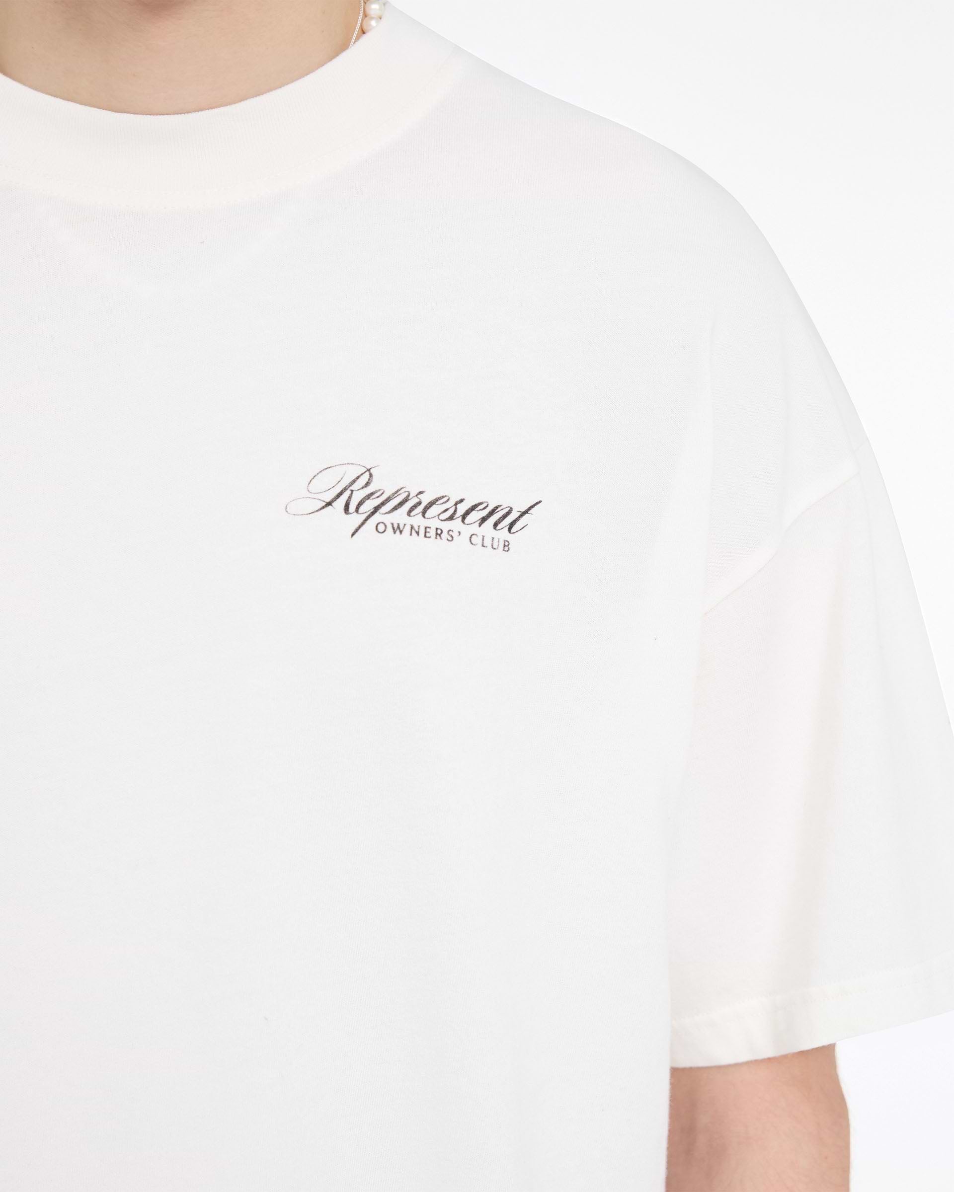 Represent Owners Club Script T-Shirt | Flat White | REPRESENT