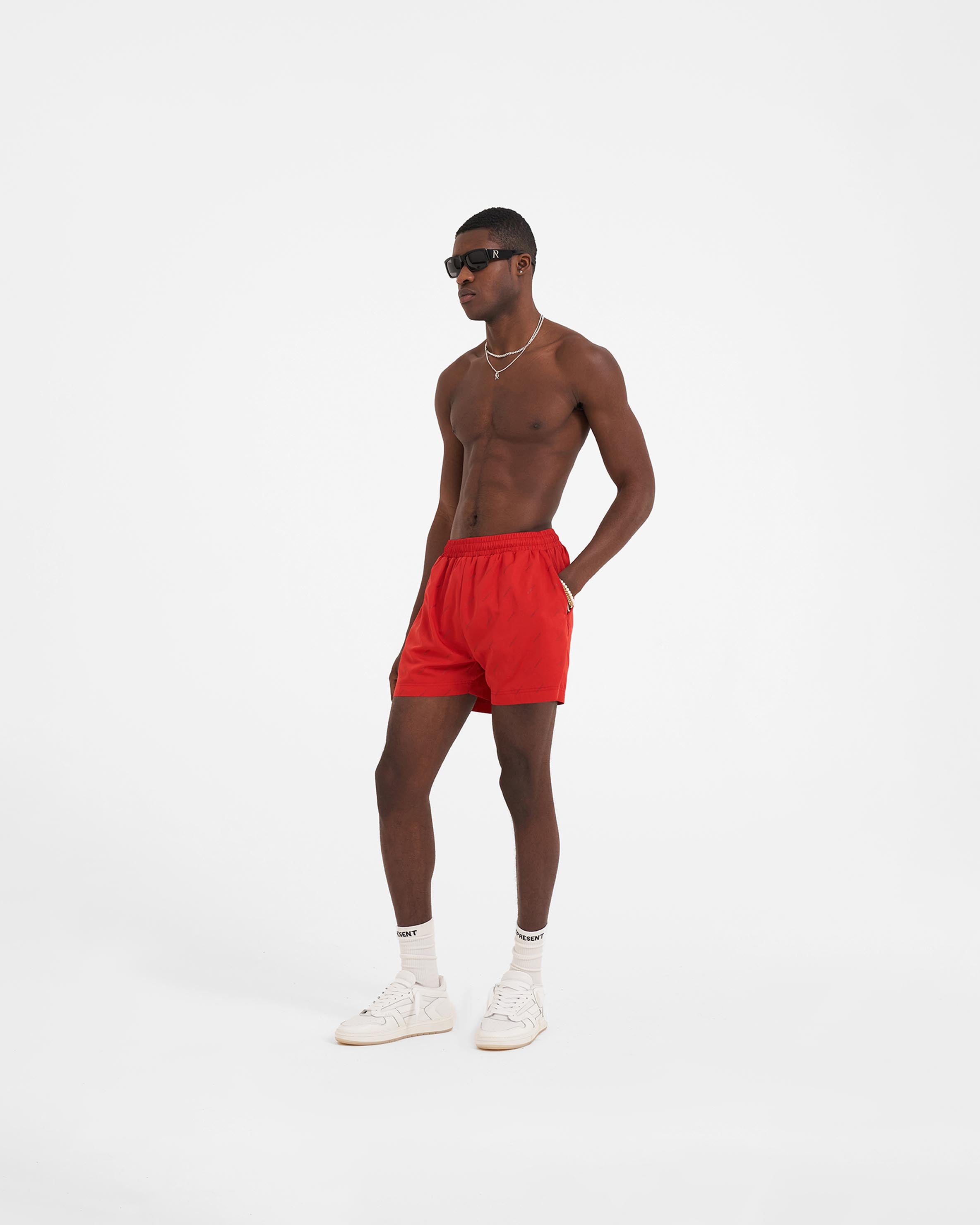 Red short deals swim trunks