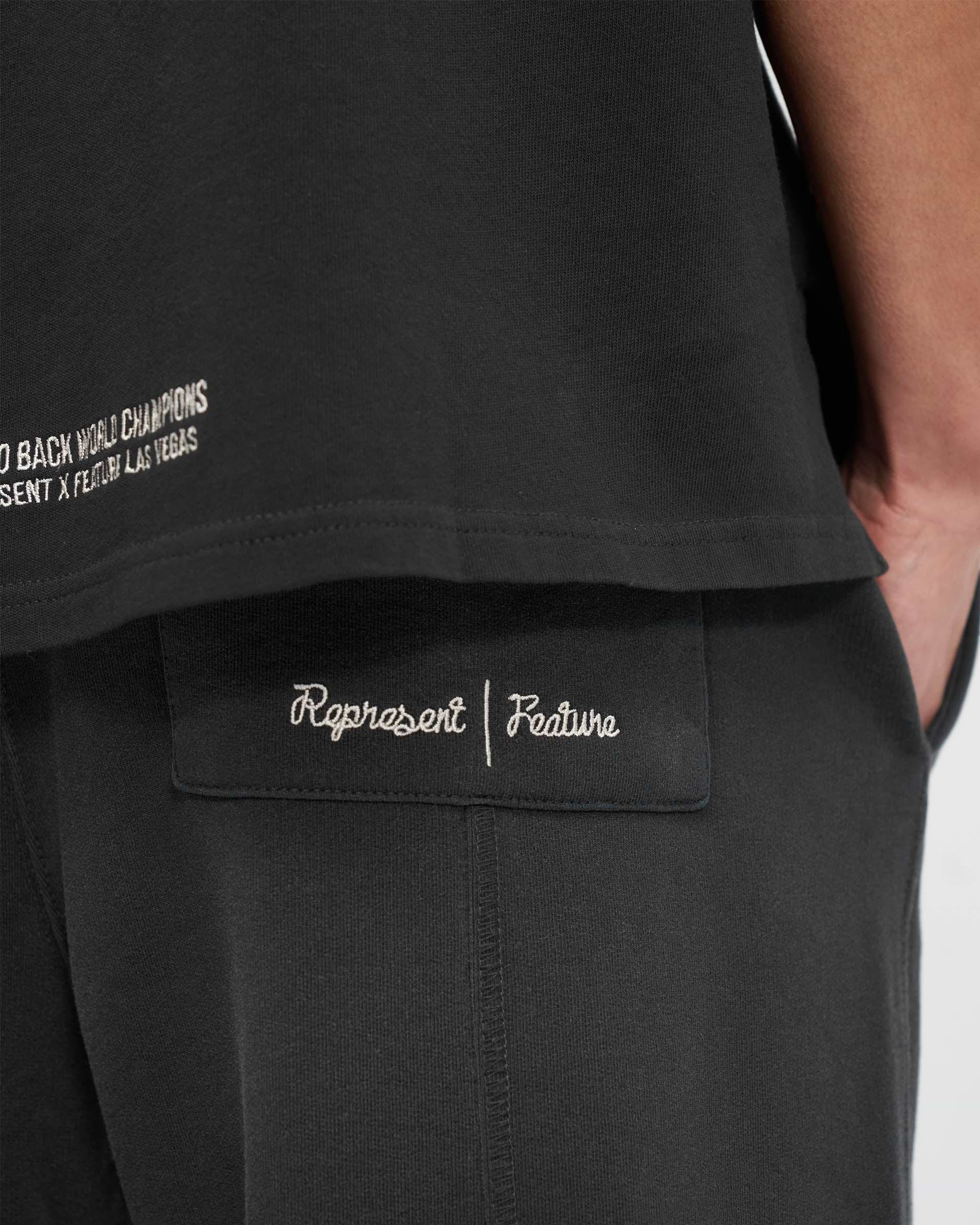 Represent X Feature Step Hem Sweatpants - Stained Black