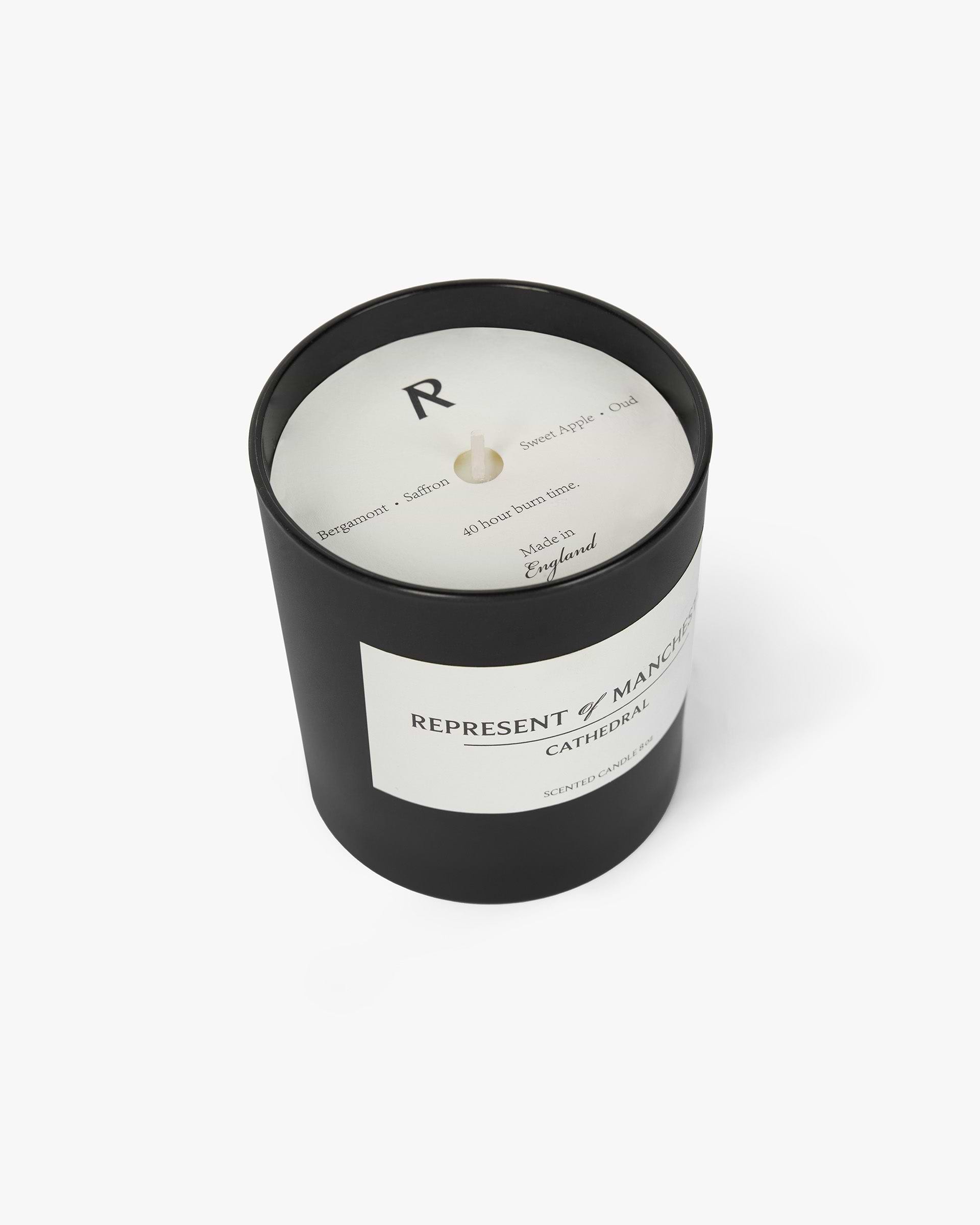 Back product image of a mens black candle on a plain white background | Manchester Store Candle in Matte Black | Scented candle with notes of bergamot and oud | Exclusives Accessories | Represent Clo