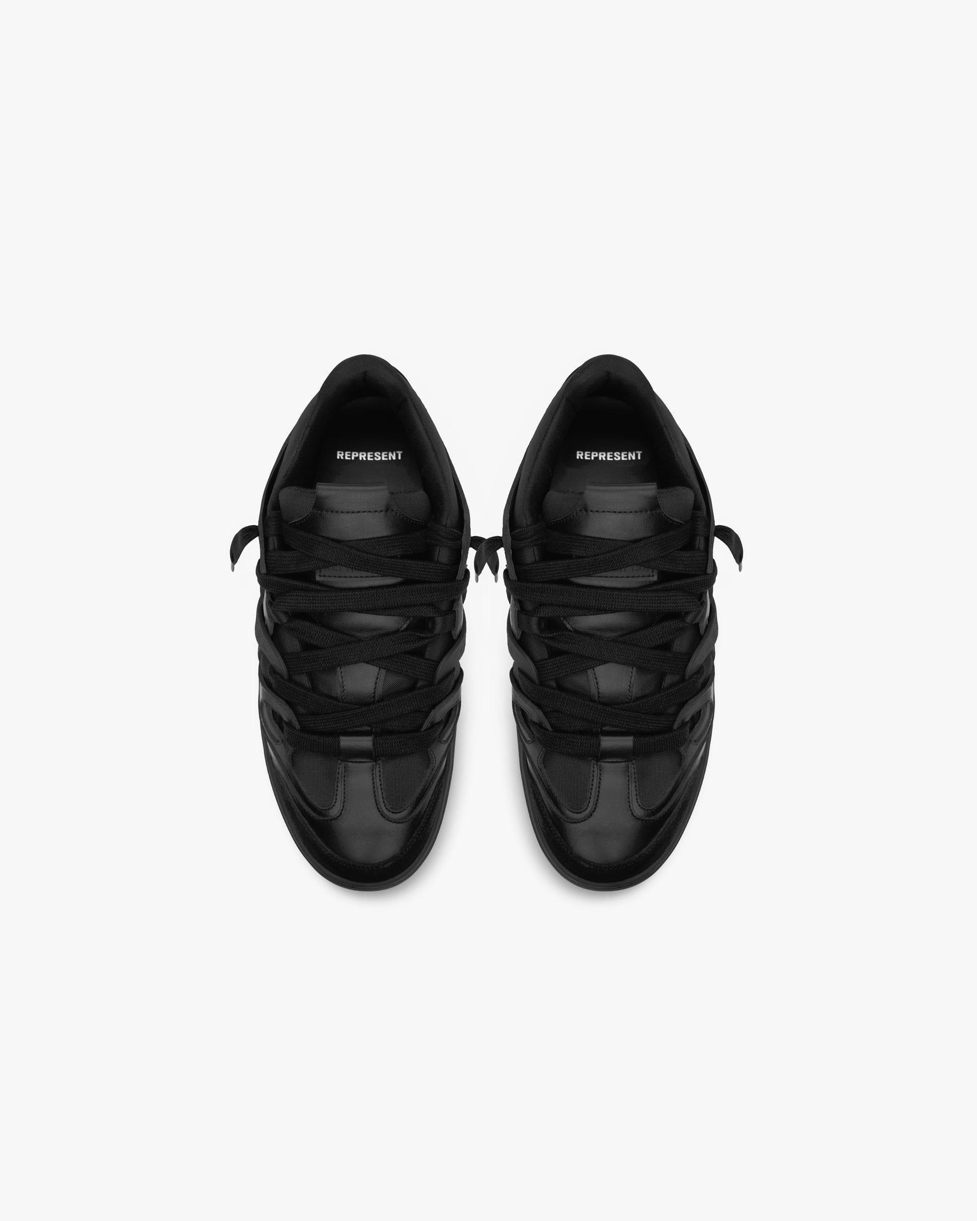 Triple best sale black sneaker