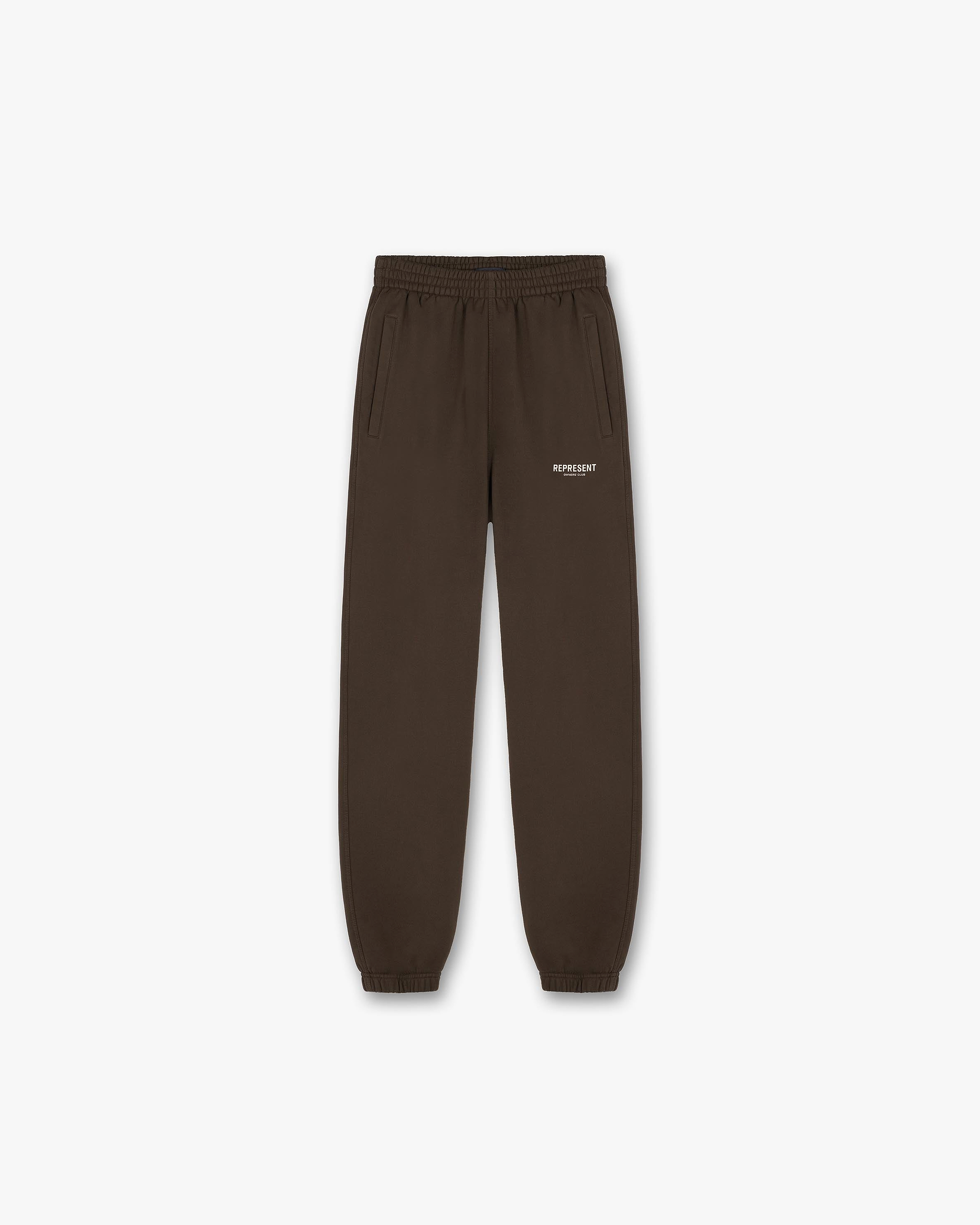 Front product image of mens brown sweatpants on a plain white background | Represent Owners Club Sweatpant in Brown | Sweatpants with a relaxed fit and elastic waistband | Owners Club Pants | Represent Clo